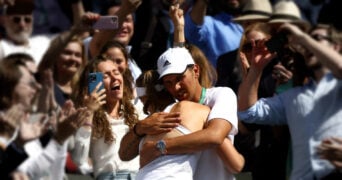 Elena Rybakina in her coach Stefano Vukov's arms, Wimbledon 2022