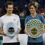 Andrey Rublev and Andy Murray with their trophies at the 2021 Mubadala World Tennis Championship