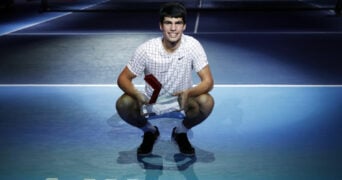 Carlos Alcaraz with the NextGen ATP Finals trophy in 2021