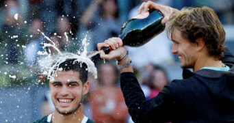 Alexander Zverev and Carlos Alcaraz during the trophy presentation of the 2022 Madrid Open