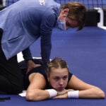 Anett Kontaveit of Estonia has her back treated during a break at the WTA Agel Open 2022 in Ostrava, Czech Republic