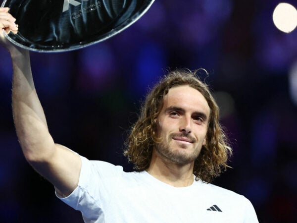 Stefanos Tsitsipas with the runners-up trophy after losing his final match against Serbia's Novak Djokovic at the 2023 Australian Open