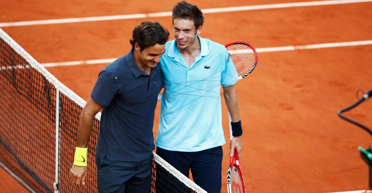 Roger Federer and Nicolas Mahut