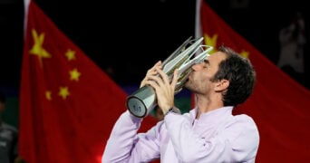Roger Federer with the winner's trophy at the ATP Shanghai Masters