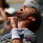 Britain's Cameron Norrie in action during his first round match against France's Benoit Paire