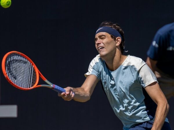 Taylor Fritz grass