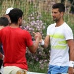 Carlos Alcaraz and Novak Djokovic (Action Plus/Panoramic)