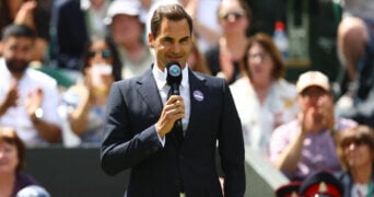 Switzerland's Roger Federer gives a speech during centre court centenary celebrations at Wimbledon 2022