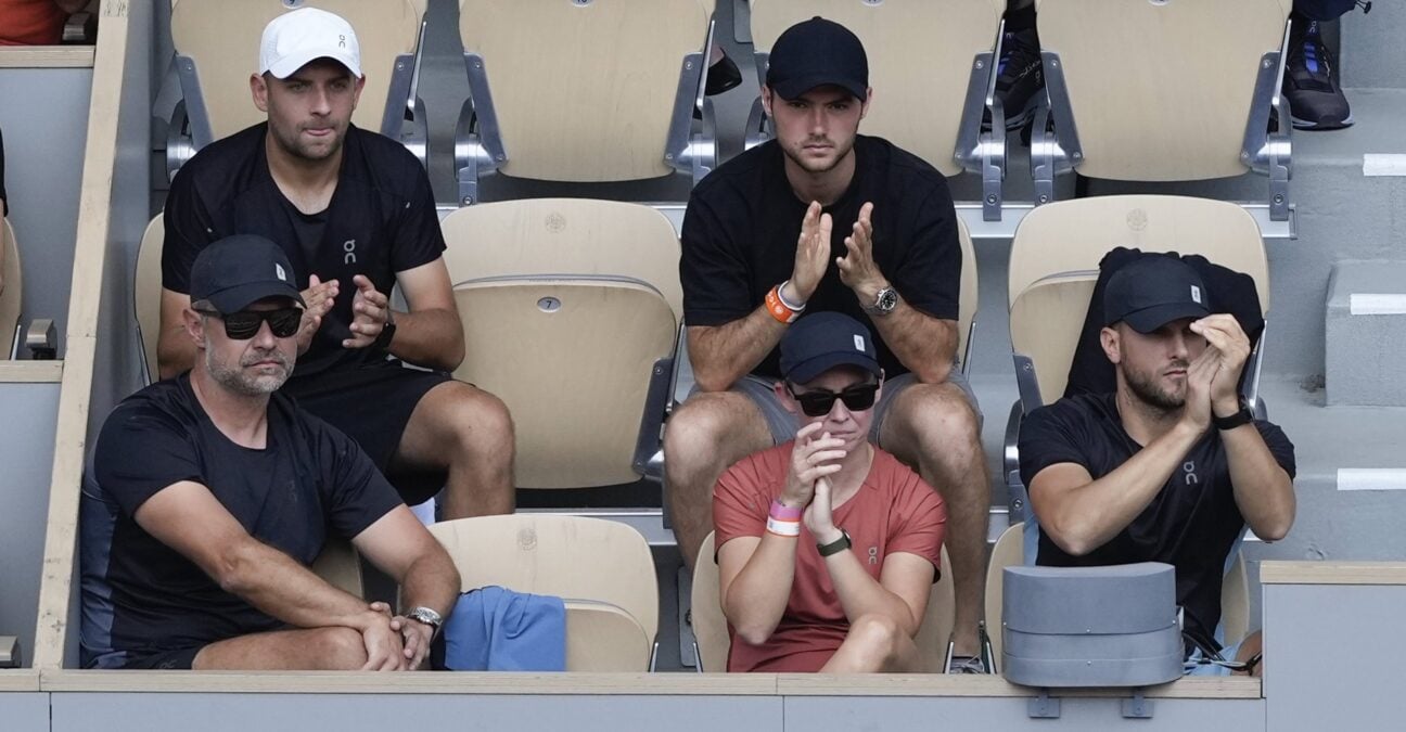 Daria Abramowicz, in red, watching Iga Swiatek's triumph in Paris.