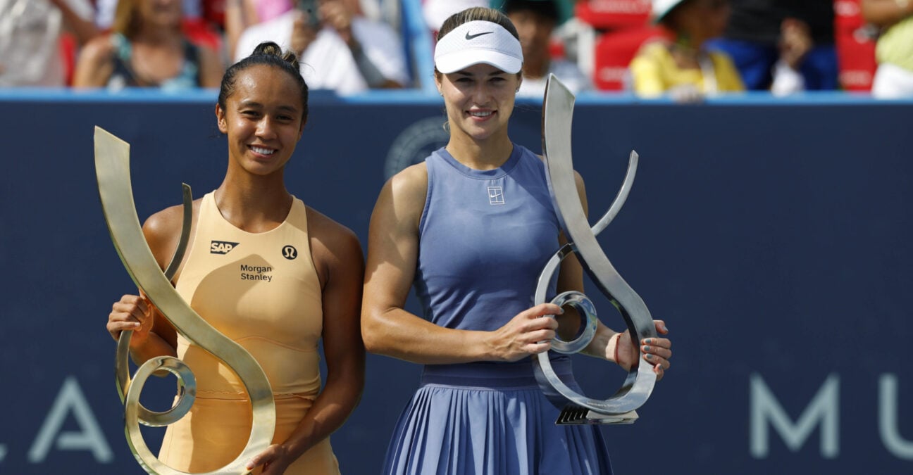 Leylah Fernandez (CAN) and Anna Kalinskaya pose with the championship and finalist trophies, respectively, after their women's singles final of the Mubadala Citi DC Open