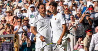 Fabio Fognini and Carlos Alcaraz meet at the net after Alcaraz wins the Wimbledon 2025 Men’s Singles first round tennis match between Fabio Fognini and Carlos Alcaraz at the All England Tennis Club in London, England. ((6257) / SPP)