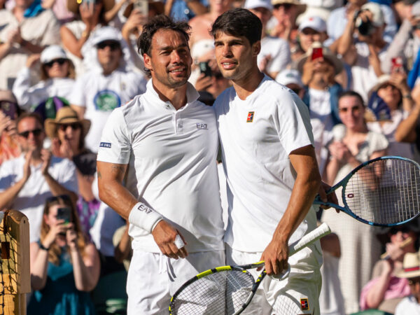 Fabio Fognini and Carlos Alcaraz meet at the net after Alcaraz wins the Wimbledon 2025 Men’s Singles first round tennis match between Fabio Fognini and Carlos Alcaraz at the All England Tennis Club in London, England. ((6257) / SPP)