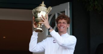 Jannik Sinner with 2025 Wimbledon trophy
