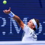 August 19, 2025, Flushing Meadows, New York, USA: Iga Swiatek and Casper Ruud (in photo) serves during a mix doubles match against Madison Keys and Frances Tiafoe at the 2025 US Open at USTA Billie Jean King National Tennis Center on Tuesday August 19, 2025 in the Flushing neighborhood of the Queens borough of New York City.