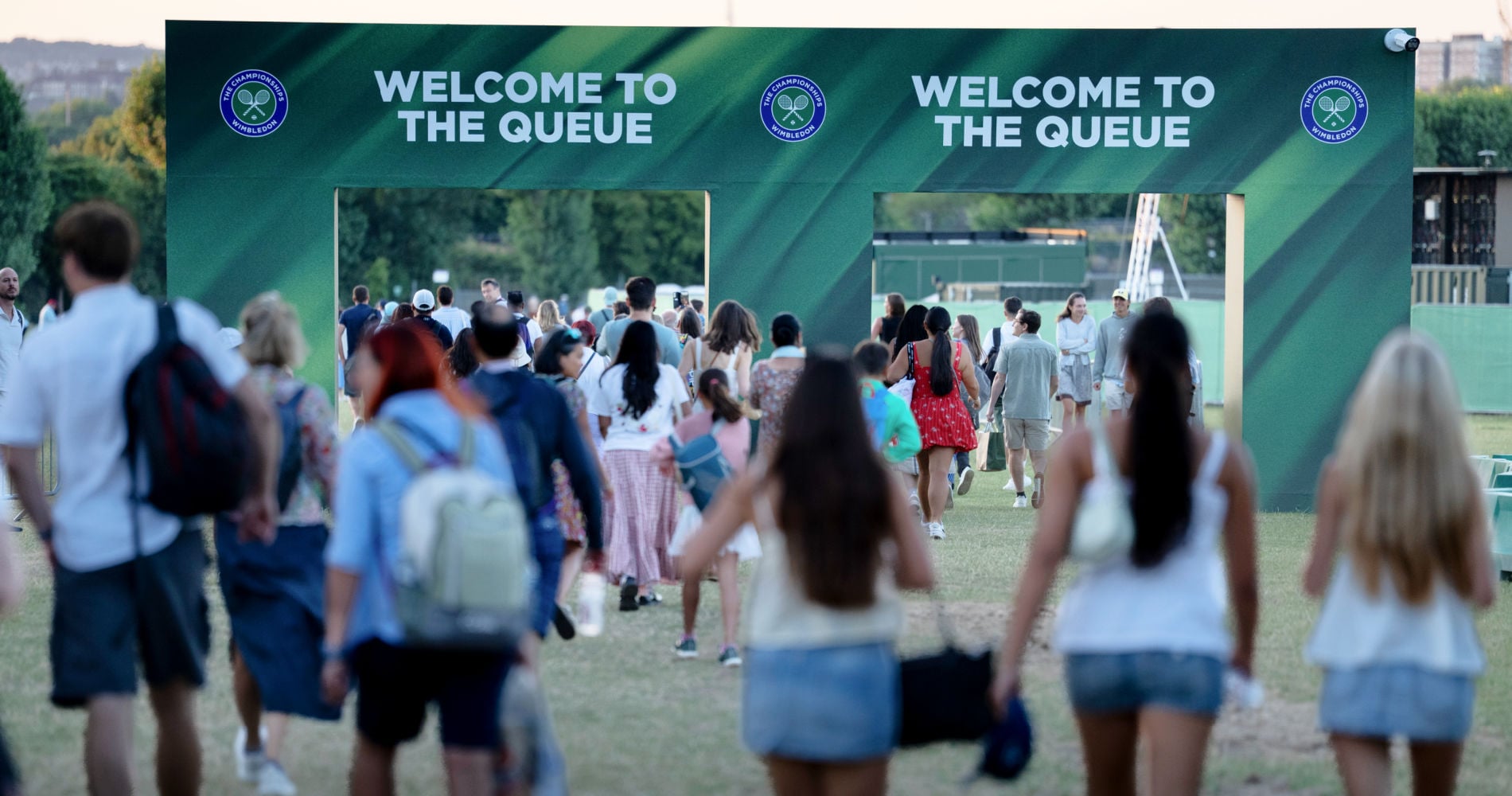 Early morning queue for tickets in Wimbledon Park at The Championships 2025