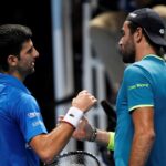 Tennis - ATP Finals - The O2, London, Britain - November 10, 2019 Serbia's Novak Djokovic shakes hands with Italy's Matteo Berrettini after winning their group stage match