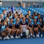 Daniil Medvedev of Russia poses for a photo with volunteers with the Rookwood Cup trophy after winning the Western & Southern Open at Lindner Family Tennis Center on August 18, 2019 in Mason, Ohio