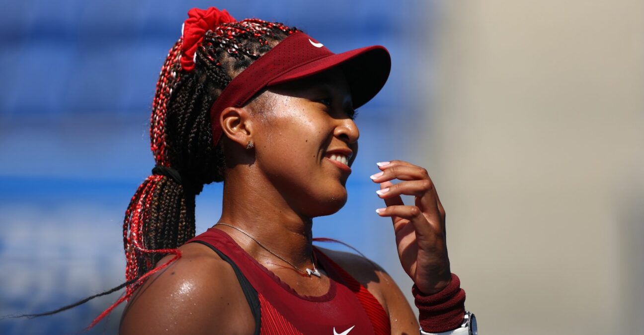 Ariake Tennis Park - Tokyo, Japan - July 25, 2021. Naomi Osaka of Japan celebrates after winning her first round match against Zheng Saisai of China