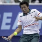 Brandon Nakashima(USA) action here loses in three sets to Yoshihito Nishioka(JPN) during their quarter-final round match at the 2020 Delray Beach Open by Vitacost.com in Delray Beach, Florida.