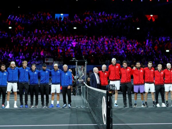 Rod Laver lines up for a photo alongside Team World players and captain John McEnroe and the Team Europe players and captain Bjorn Borg before the start of play at the 2019 Laver Cup