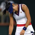 Emma Raducanu reacts after losing a point to Aliaksandra Sasnovich at the Indian Wells Tennis Garden.