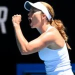 Danielle Collins of the U.S. reacts during her fourth round match against Belgium's Elise Mertens at the 2022 Australian Open