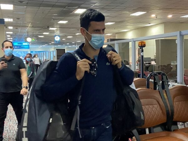 Novak Djokovic walks at Dubai Airport in Dubai, United Arab Emirates, January 17, 2022.