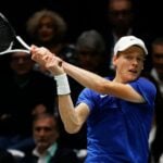 Jannick Sinner hitting a backhand during the Davis cup 2022 in Bologna, against the Swedish Mikael Ymer