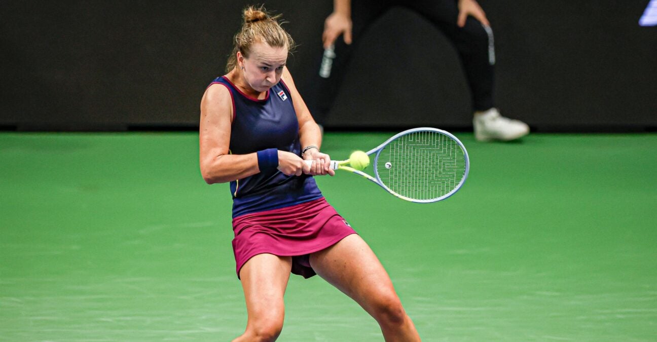 Barbora Krejcikova is hitting a return agains Belina Bencic dureing their semi-final in Tallinn in 2022.