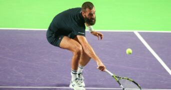 Benoît Paire hits a backhand volley during a match at the Challenger of Rennes in 2022