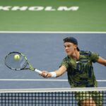 Holger Rune hits a forehand dropshot volley during his semi final against de Minaur in Stockholm in 2022