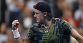 Holger Rune pumps himself during his semi-final against Roberto Bautista Agut in Basel in 2022