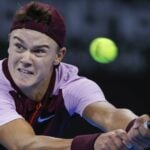 Holger Rune hitting a forehand in Sofia 2022