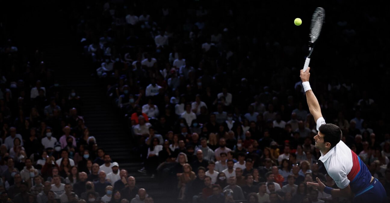 Novak Djokovic hits a serve during the finale of the Rolex Paris Masters 2022 against Daniil Medvedev.