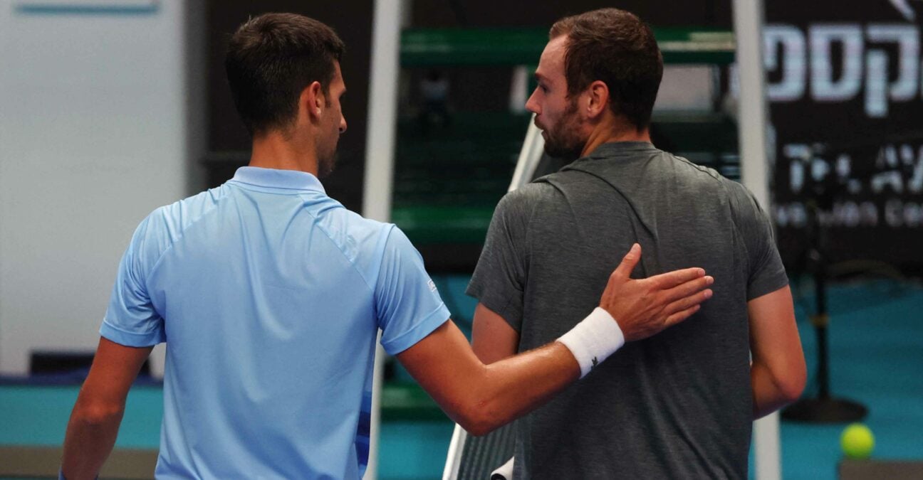 Novak Djokovic hanshake with Russian Roman Safiullin in Tel Aviv in 2022Tel Aviv 2022