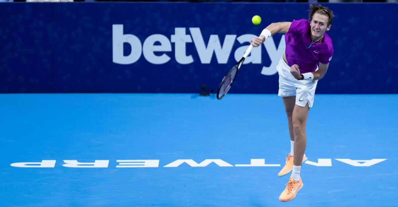 Sebastian Korda hits a serve during his victory against Dominic Thiem in the semi-final of Antwerp in 2022