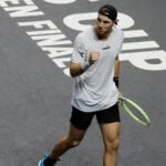 Jan-Llenard Struff pumps himself during his match against Denis Shapovalov in Davis Cup in 2022