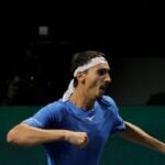 Lorenzo Sonego Davis Cup 2022 celebrates pumping silver bowl