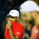 Rajeev Ram Davis Cup 2022 Jack Sock in front white cap red tee-shirt