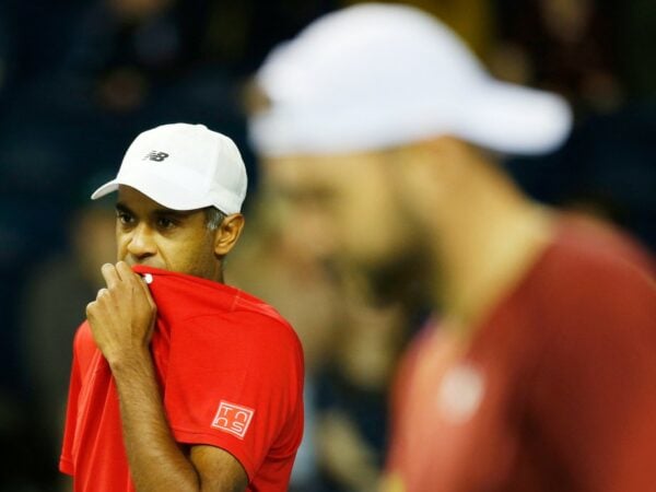 Rajeev Ram Davis Cup 2022 Jack Sock in front white cap red tee-shirt