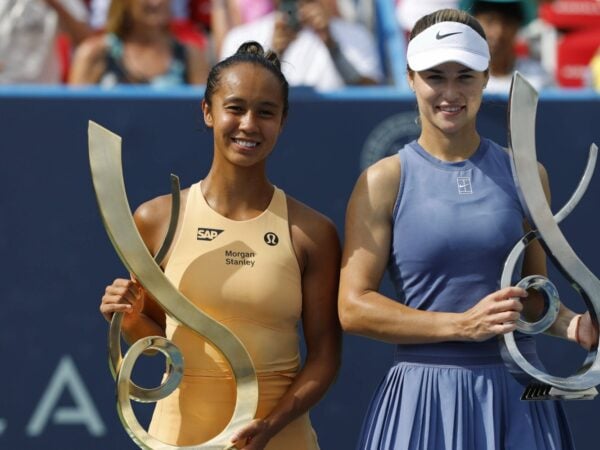 Leylah Fernandez (CAN) and Anna Kalinskaya pose with the championship and finalist trophies, respectively, after their women's singles final of the Mubadala Citi DC Open