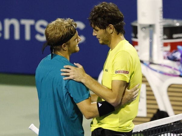 Jul 25, 2025; Washington, D.C., USA; Alejandro Davidovich Fokina (ESP)(L) shakes hands with Taylor Fritz (USA)(R) at the net after their men's singles quarter-final of the Mubadala Citi DC Open at Rock Creek Park Tennis Center. Mandatory Credit: Geoff Burke-Imagn Images/Sipa USA/62962259/sb4/2507260810